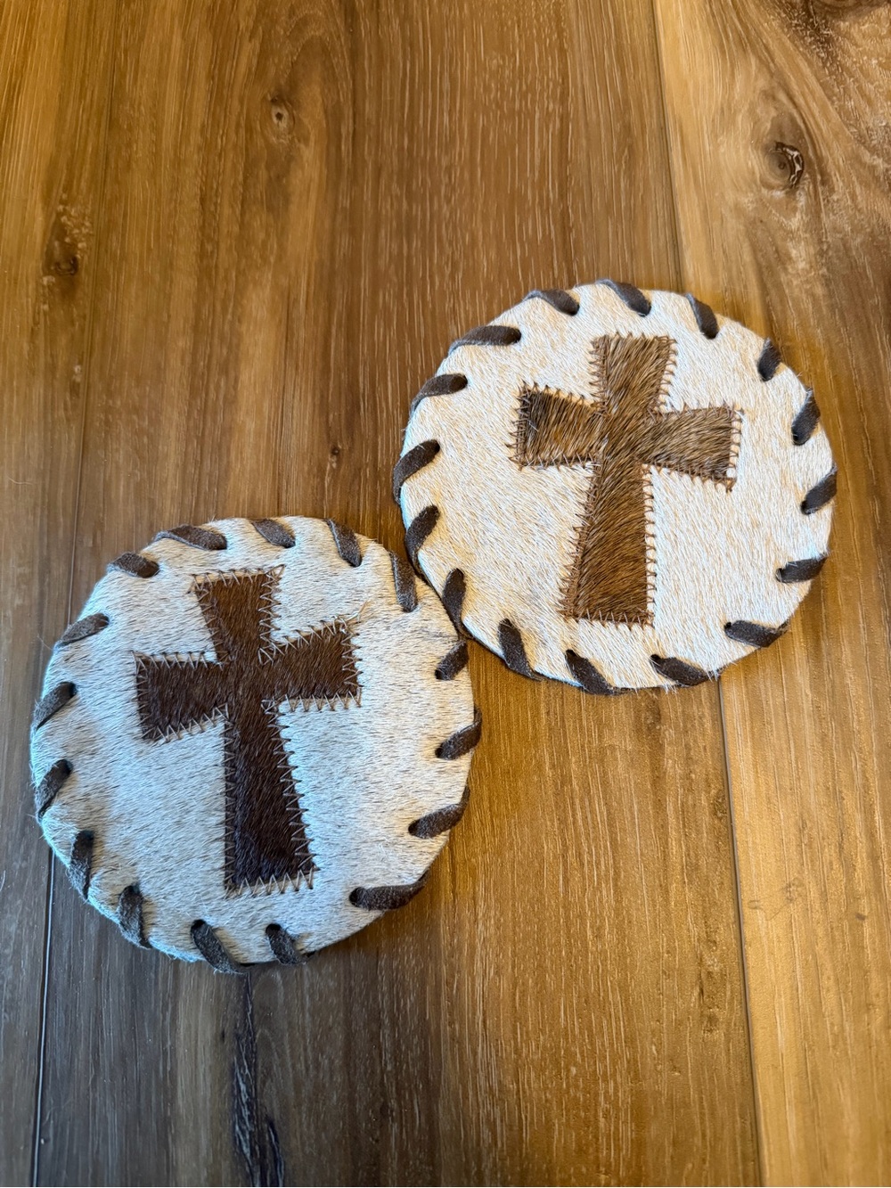 Handcrafted Cowhide Cross Coasters - Brown and White